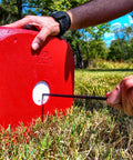 High Roller Foam Archery Target Cube With 21 Bullseyes, 13 inch by 13 inch, lawn setup using carrying handle outdoors