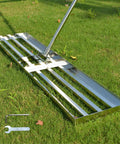 Effortless Lawn Leveler Tool For Fast Ground Leveling Stainless Steel Yard Rake with durable handle on green lawn