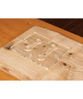 Rock Solid Dual Stitch Router Inlay Clear Block Thick Acrylic Jig Made For Plunge Routers Using 1/8 Bit Sizes To Nail Precision Woodworking Layouts And Fit Tight on wooden surface.