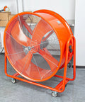 Smooth Rolling Industrial Drum Fan Cranking Out Serious Airflow To Crush Heat And Clear Smoke Quick 15000 Cfm Motor Works Hard All Day Long For Workers on wheels.