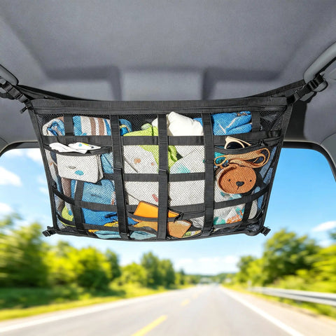 Ceiling Cargo Net With 3 Pockets And Double Layer Mesh Overhead Storage Organizer in SUV, showing packed items during a drive.