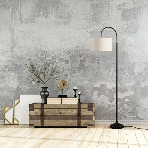 Nora Arc LED Tall Floor Lamp With Heavy Base For Living Room And Office near a wooden chest in modern decor setting.