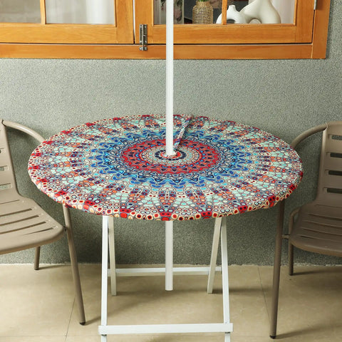 Two Pack Round Outdoor Tablecloths With Umbrella Hole Anti Wrinkle Polyester Hidden Zipper Elastic Edge Fit For 45 To 53 Inch Tables Mandala Design Perfect For Patio Hangouts Camping And Summer Parties shown on table with chairs