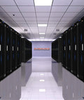 Slick 37U Floor Standing Server Rack With 24 Inch Deep Network Cabinet and Locking Mesh Door in a modern data center aisle.