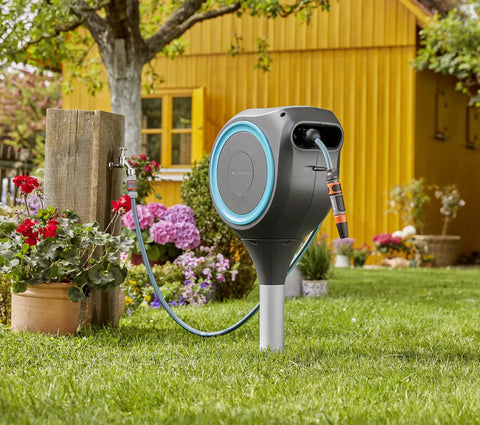 Automatic Retractable Garden Hose Reel With 50 Feet Of Easy Retracting Hose 360 Degree Swivel Metal Spike Base UV Resistant Housing