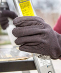Brown Jersey Winter Work Gloves With Red Fleece Lining for warmth shown gripping ladder outdoors