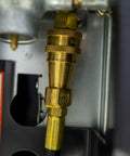 Close-up of brass fitting on the 12Ft Big Buddy Propane Hose With Regulator For Indoor Outdoor Heaters, POL connection visible