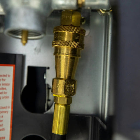 Close-up of brass fitting on the 12Ft Big Buddy Propane Hose With Regulator For Indoor Outdoor Heaters, POL connection visible