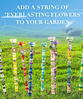 513 Piece DIY Beaded Garden Stakes And Fairy Wand Craft Kit With Sparkling Crystal Accents And Eighteen Rock Solid Threads in colorful display on grass.