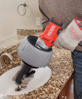 K-45AF Air Powered Drain Cleaner 230V Drum Auger for Swage Lines and Sewer Pipes in use near bathroom sink.