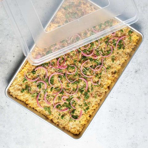 Extra Large High Sided Baking Pan With Lid For Big Batches Uncoated Aluminum Sheet Pan with cooked dish inside