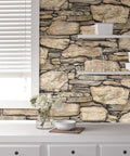 Hadrian Stone Peel And Stick Wall Covering Brown Removable Wallpaper displayed in a kitchen setting, showcasing stone accent wall effect.