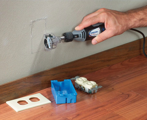 Quick Swap Mini Saw Rotary Tool Accessory For Boss Grade Perpendicular Cuts Up To Quarter Inch in use for wall cutting.