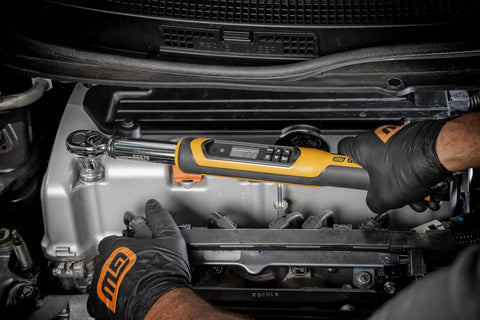 Mechanic using Three Eighth Inch Drive Electronic Torque Wrench With Target Torque Alert Vibrating Handle Buzzer And LED Indicates When Target Is Reached 7.4 To 99.6 Ft Lb Range Includes Multiple Units Ft Lb In Lb Nm Kg M Kg Cm For Precise Auto And Bike Maintenance Be on engine bolts