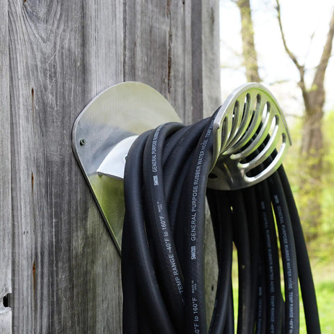 Heavy Duty 13 Inch Cast Aluminum Hose Rack For Outdoor Walls, Curved Wall Mount Hose Holder, storing black hose on wooden wall