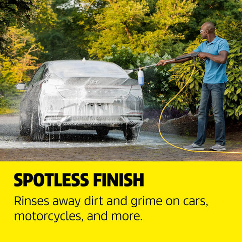 Man using All In One Vehicle Wash And Wax Soap For Pressure Washers Heavy Duty Clean And Shine Universal Fit to clean a car
