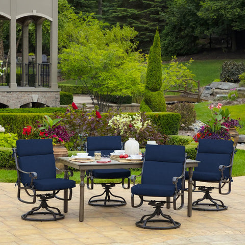 Comfy Outdoor Chair Cushion Set 21 By 20 Inch Seat With 21 By 24 Inch Back Cushion Rainproof And Fade Resistant Eco Friendly PFAS Free C0 Treated 100 Percent Polyester Fits Most Standard Outdoor Dining Chairs Sapphire Blue Leala on metal chairs around patio table in garden setting.