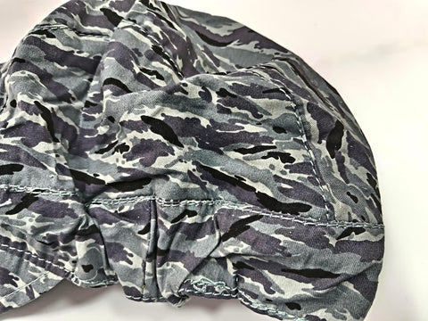 Top Shelf Single Pack Pure Cotton Welding Cap With Breathable Mesh Liner Insert Sweat Absorbing Inner Hood For Welders Heavy Duty Grey Comfortable Machine Washable One Size Fits Most Professional Welding Gear Headwear shown from overhead view featuring abstract camouflage pattern.