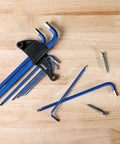 Metric Long Arm Ball End Hex Key Set With Chrome Finish And Bright Blue Anti-Slip Coating Includes 9 Sizes From 1.5mm To 10mm on wood