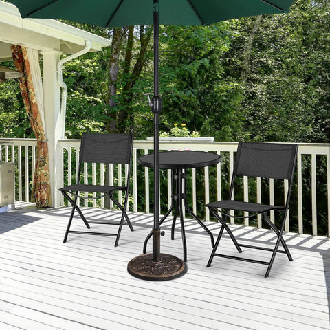 Heavy Duty Round Antiqued Umbrella Base for Outdoor Patio All Weather Bronze Stand 22 Lb Resin and Iron Construction Built to Last for Patios and Gardens supporting an umbrella on a white deck with chairs.