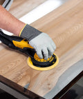 Top Tier 6 Inch Random Orbital Sander Featuring A Smooth Brushless Motor And Effective Dust Extraction Built For Rough Woodshop Jobs drywall sanding on wood surface.