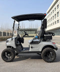 Two Seater Electric Golf Cart With Independent MacPherson Strut Suspension And Tuned Coil Spring Shocks side view with gray shell and black wheels.
