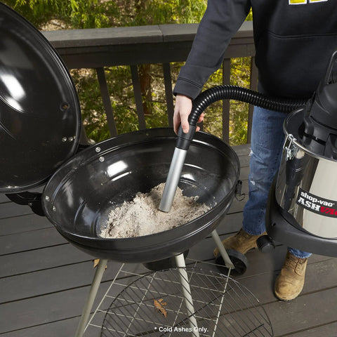 Using HEPA Cartridge Filter For Ash Vacuum - Dry Ash Filtration in grill, showing ease of cleanup with ash vacuum nozzle