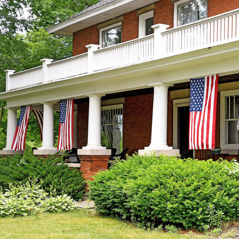 Premium 5x8 American Flag Built Tough For All Weather Outdoors Heavy Duty PolyMax Polyester With Sewn Stripes Displayed on Porch