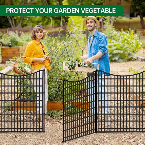 Couple standing by 18 panel no dig decorative fence with gate for outdoor yard and patio, 33 inches high, rustproof metal wire garden barrier