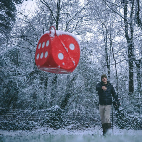 High Roller Foam Archery Target Cube With 21 Bullseyes, 13 Inch By 13 Inch in a snowy forest