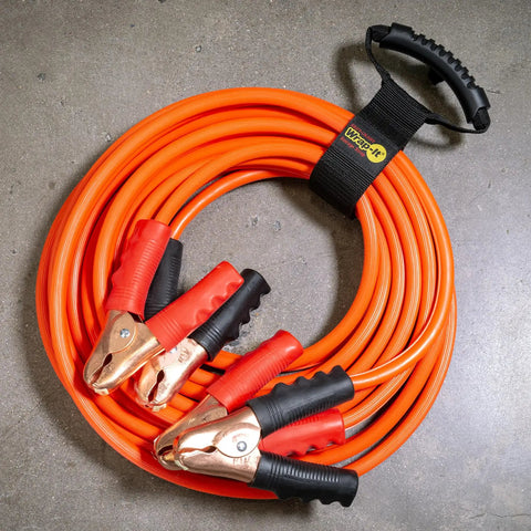 Assorted Three Pack Heavy Duty Easy Carry Straps With Built In Handle For Garden Hose Extension Cords Cables And Gear Organization In The Garage Boat And RV Great For Garden Tools Cords Hoses Power Cables And All Your Garage Boat And RV Organization Needs wrapped around orange jumper cables with plastic grips and copper clamps.