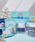 DIY jewelry making kit assortment with colorful packaging, including stitch markers and wine charms, displayed on a table.