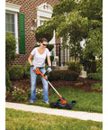 Person using 3 In 1 Cordless Weed Eater Lawn Edger And Lawn Mower With Two Batteries And Charger 12 Inch Battery Powered String Trimmer