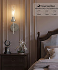 Seasonize Sand Nickle Battery Operated Wall Sconce Set of 2 mounted beside a bed, featuring a timer function.