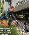 Man using Heavy Duty Aluminum RV Anti-Wobble Stabilizer With Ratchet Tension on RV, showing 17 to 35 inch lateral support