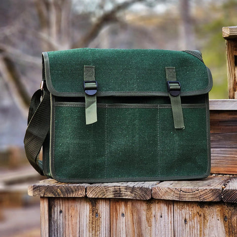 Deluxe Rockhound And Rock Mining Kit For Pros And Hobbyists 15 Piece Set with green musette bag on wooden surface