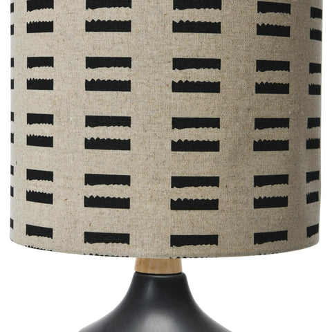 Natural Wood And Black Ceramic Table Lamp With Linen Mudcloth Shade, Rotary Switch, 60W Max, detail of patterned linen shade
