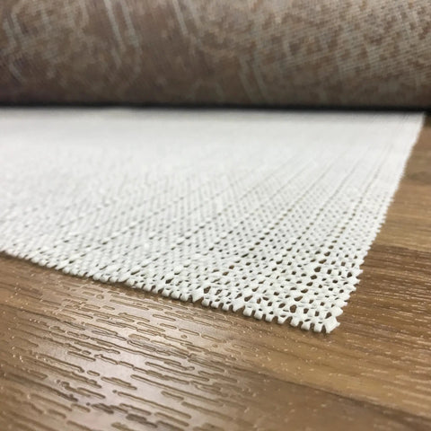 Keeps Rugs Anchored Solid On Hardwood Or Tile Floors Dropping The Slide Hassle This Cream Open Weave Rug Pad on wood floor.