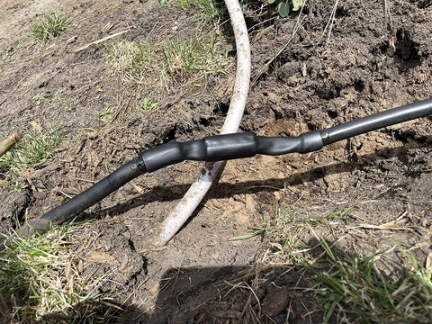 Get This Heavy Duty Underground Wire Splice Kit For Submersible Pumps Featuring Clear Dual Wall Heat Shrink And Black Outer Sleeve To Seal 16-14 Awg Four Conductor Cords Waterproof And Repair Electrical Connections With Ease. black heat-shrink cable splice on buried wire