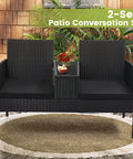 Two Seat Outdoor Patio Loveseat With Table In Black Wicker Rattan Outdoor Set With Washable Cushion Covers in garden setting