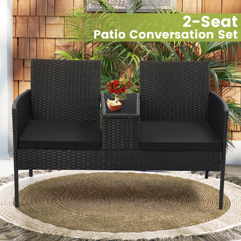 Two Seat Outdoor Patio Loveseat With Table In Black Wicker Rattan Outdoor Set With Washable Cushion Covers in garden setting