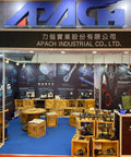 Trade show booth with air tools displayed by Apach Industrial Co., blue carpet, wooden shelves, industrial lighting
