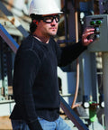 Worker wearing Ultra Light I Force Slim Safety Goggles With Black Frame And Clear Anti Fog Lens near industrial equipment