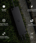 Outdoor Landscape Low Voltage Plug In Power Supply Kit with Dual Output, weatherproof, on grassy path with connection indicators.