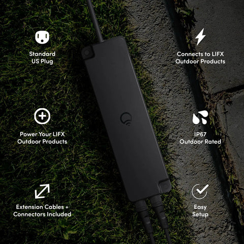Outdoor Landscape Low Voltage Plug In Power Supply Kit with Dual Output, weatherproof, on grassy path with connection indicators.