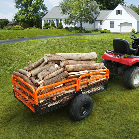 Tow Behind Dump Cart For Lawn And Garden 1500 Pound Capacity 15 Cubic Feet Heavy Duty Yard Garden Trailer attached to mower hauling logs