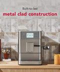 Heavy Duty Stainless Steel Espresso Machine With Removable Bean Hopper And Auto Milk Frother Built To Last And Brews Like Butter For Any Home Barista Game Changer Setup on wooden countertop.