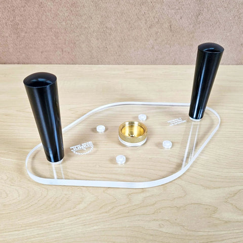 TrimFit Pro Dual Grip Router Base Plate for DeWalt DWP611 and DCW600B, clear acrylic with handles, guide bushing visible