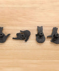 Four Pose Cat Cast Iron Drawer Knobs For Dresser Cabinet Wardrobe And Bookcase Vintage Kitty Pull Handles That Add Fun Charm And Character To Furniture And Home Decor black cast iron cat knobs shown on wood