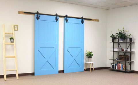Installed Rustic Black Non Bypass Sliding Barn Door Hardware Kit For Two Doors 9 Ft Flat Track with blue doors in a room